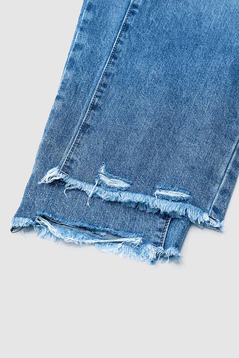 Jeans rasgados com bainha crua e cintura média e perna reta